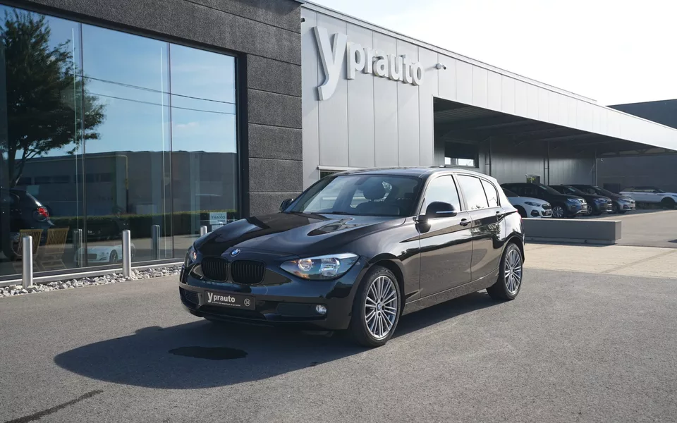 BMW 114i 5-deurs Navigatie Parkeerhulp Lederen interieur Open dak Cruise control Airconditioning volledig groot onderhoud gehad!